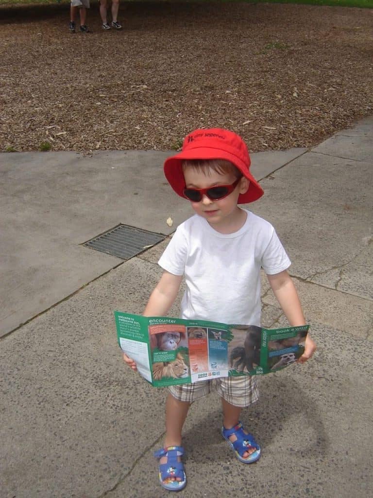 Alex with the map at Melbourne Zoo